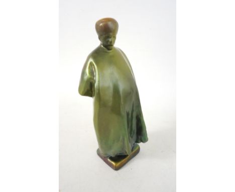 UNUSUAL ZSOLNAY PECS FIGURE OF A MIDDLE EASTERN CLERIC
in iridescent green eosin glaze, 24.5cm high