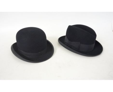 BLACK HOMBURG HAT
by Christies London, size 7 3/4; and a black bowler hat by G.A. Dunn & Co., size 7 1/2 (2)