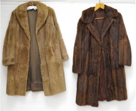 VINTAGE LADY'S SQUIRREL FUR COAT
with shawl collar and silk lining, and a musquash fur coat with outer pockets and silk linin