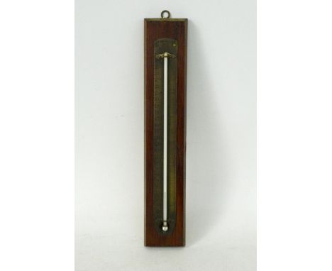 BRASS THERMOMETER 
with a fahrenheit scale and makers name T.A.Reynolds & Co. London, mounted onto a pine section, 41cm high 