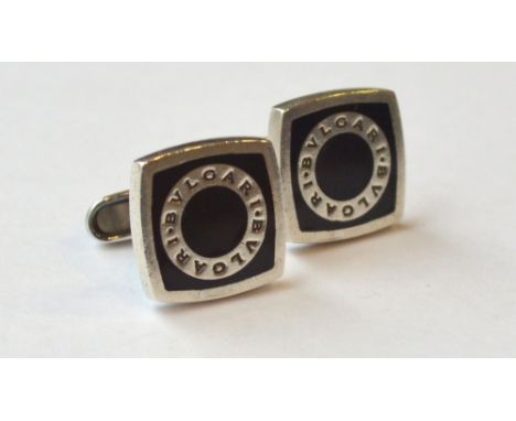 PAIR OF SILVER BULGARI CUFFLINKS
with black enamel detail
