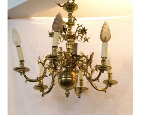 GILT METAL SIX BRANCH CHANDELIER
the shaped central column with a bird figure above six small scroll arms, with six large sha