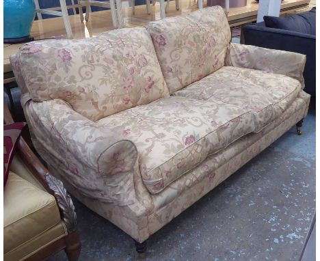 GEORGE SMITH SOFA, in Bennison upholstery on turned front legs with brass castors, 190cm L. 