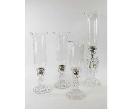 1970'S BACCARAT, three various storm lamps (one base repaired), and a Baccarat lustre storm lamp. (4)