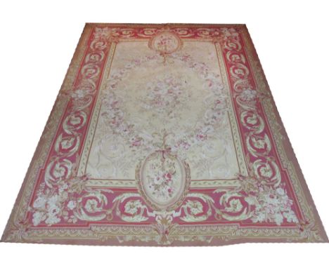 AUBUSSON SAVOUNERIE DESIGN CARPET, 370cm x 267cm, traditional rose and scrolling leaf design on an ivory field. 