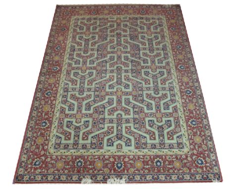 FINE PERSIAN QUM CARPET, 270cm x 195cm, allover design of palmettes and foliage in a linear pattern inside a repeat palmette 