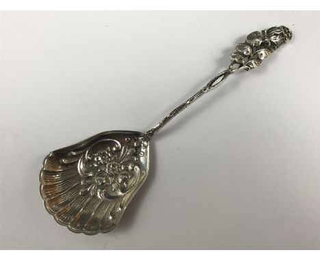 A Swedish white metal caddy spoon, with naturalistically modelled rosebud terminal and stem, impressed import mark, 15g 