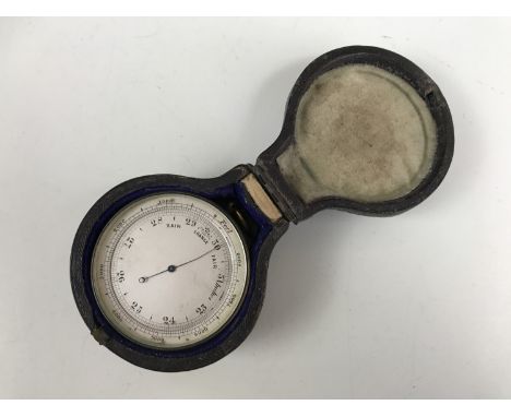 A late 19th Century Singer's Patent pocket combination barometer / altimeter, thermometer and compass, in lacquered brass wit