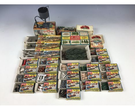 A large collection of Merit OO Gauge and HO Gauge model railway accessories, including Coal Office, Coal Bunker, Water Tower,