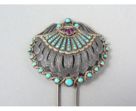 A Belle Epoch turquoise and ruby set parcel-gilt white metal hair pin, in a tiered and scalloped design incorporating feather