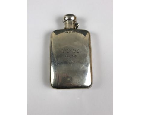 An Edwardian silver hip flask, bearing engraved dedication 'C.G.A.B February 26th 1903', Mappin and Webb, Birmingham, 1902, 1