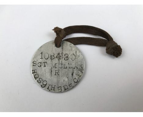 A Great War aluminium identity disc, that of 108430 Sgt R McLean, HQS, 9th Bde, CFA