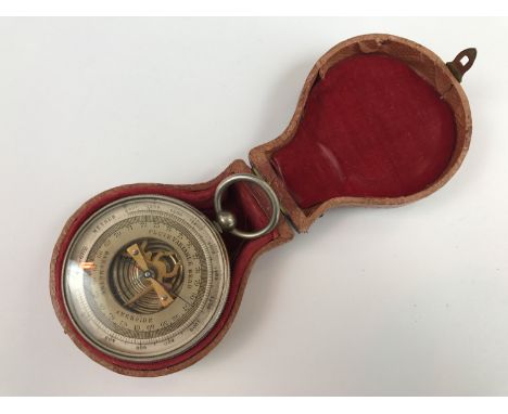 A late 19th Century French pocket aneroid barometer, in fitted case