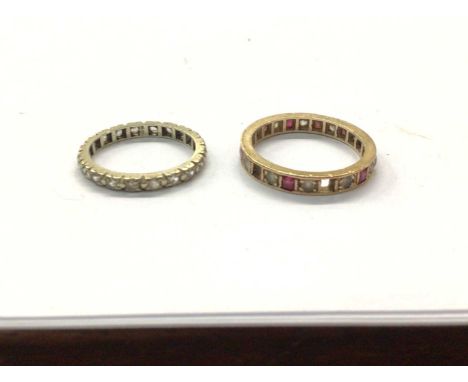 9ct gold gem set eternity ring and one otherCondition report: 9ct gold ring weighs 1.5 gramsOther ring not marked and weighs 