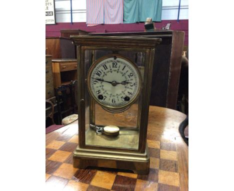 Late 19th century American 8 day mantel clock in brass four-glass case by New Haven Clock Co.