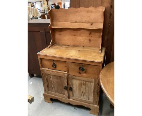 Old pine chiffonier with raised shelf back, two drawers and two panelled doors below, 81cm wide, 42.5cm deep, 132cm high