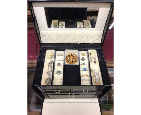 Jewellery box containing 9ct white gold three stone ring, other gem set dress rings, necklaces, brooches, some silver jewelle