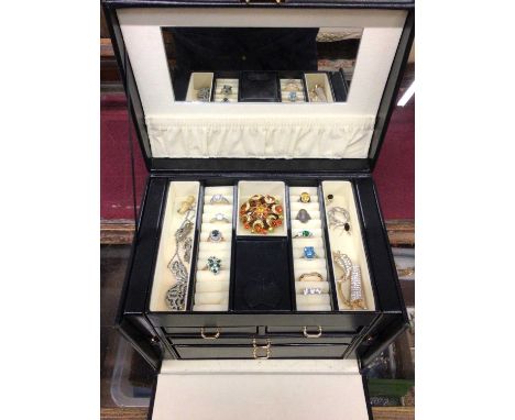 Jewellery box containing 9ct white gold three stone ring, other gem set dress rings, necklaces, brooches, some silver jewelle