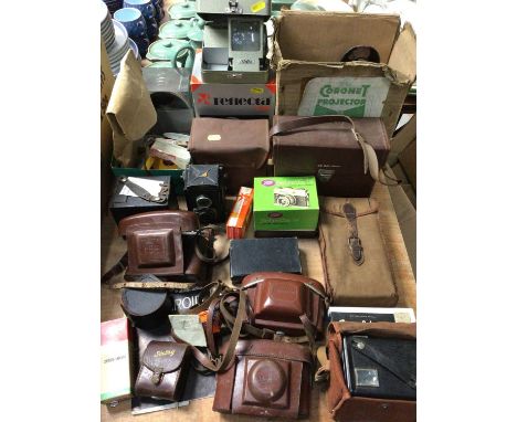 Group vintage cameras including Voigtlander Brilliant, Kodak, Coronet projector and accessories