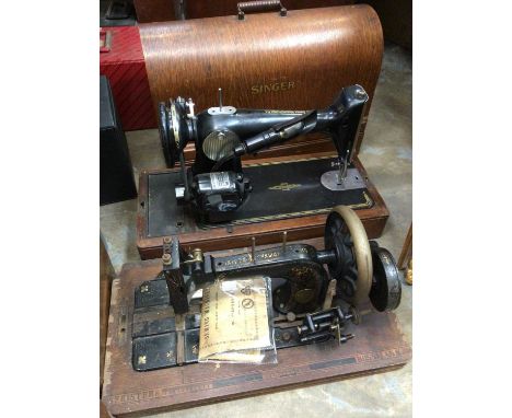Three vintage sewing machines to include two Singer and Frister &amp; Rossmann, together with Underwood typewriter