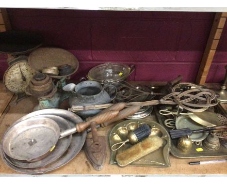 Quantity brass and other metalware including oil lamp base, kitchen scales, pans and some plated items (2 shelves)