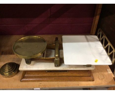 Edwardian The United Yeast Co Ltd brass and china balance scales on a marble and oak plinth plus set of circular brass weight