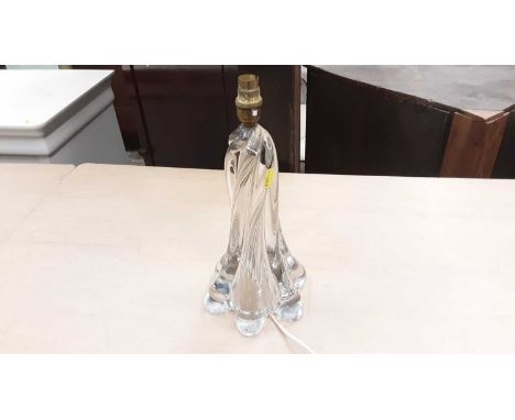 Glass table lamp together with a brass hanging light