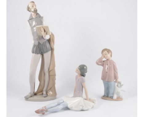 Large Nao porcelain figure, 38cm; Lladro model of a boy; two Nao figures; three German Nao style figures; Beswick Woodpecker.