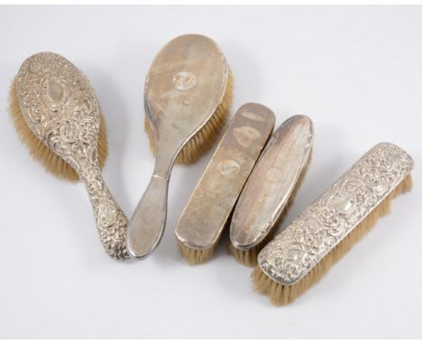 Silver-backed silver part dressing table set, Birmingham 1942, comprising hairbrush and clothes brush, engine-turned decorati