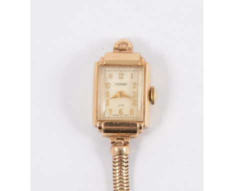 A lady's Rotary bracelet watch, rectangular cream arabic dial in a 9 carat yellow gold case fitted with a snake link bracelet