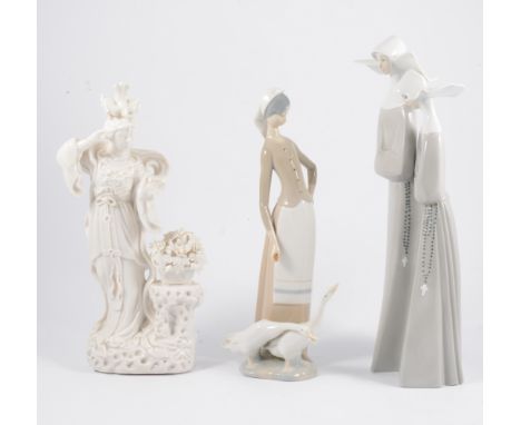 Large Lladro model, two Nuns, 34cm; Lladro model, girl and geese; Lladro model, two doves; Nao model; Coalport model; Wedgwoo