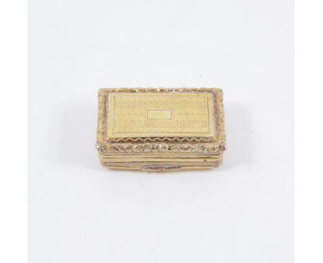 A George IV silver-gilt vinaigrette, engine turned design with vacant initial plate and cast scroll border, 34mm x 24mm, comp