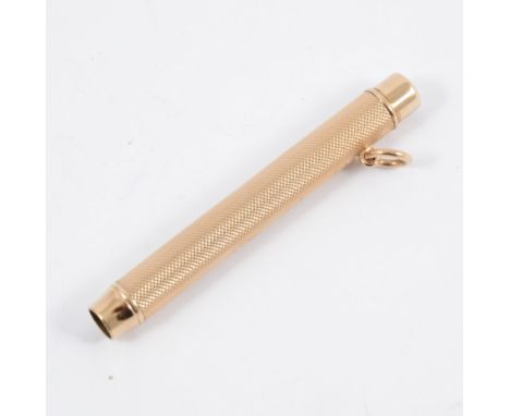 Pencil.  A 9 carat yellow gold engine turned pencil 8cm long, by Sampson Mordan.