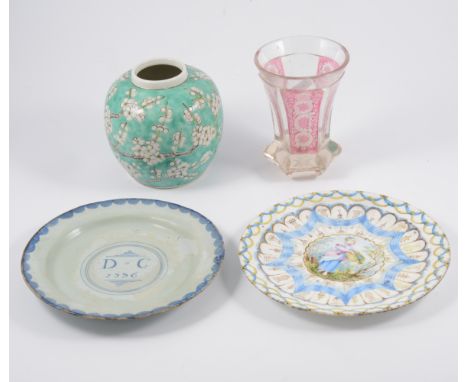 Polychrome pottery plate, centre painted with a girl and basket of flowers, 20cm; Delft plate, tea bowls and saucers.