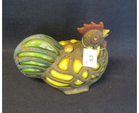 Heavy metal and glass candle light holder in the form of a chicken. (B.P. 24% incl. VAT)
