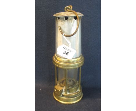 Brass and aluminium miner's safety lamp in used condition. (B.P. 24% incl. VAT)