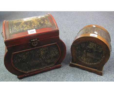 Early 20th Century dome topped caddy or box with hinged cover and repousse trailing vine decoration, together with another la