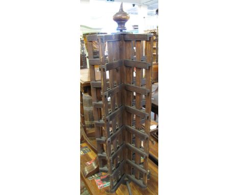 Early 20th Century revolving postcard stand on tripod base. (B.P. 24% incl. VAT)