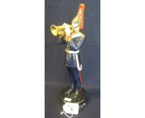 A Michael Sutty porcelain figure of a Horse Guards bugle player, printed marks to base. 30cm high approx. (B.P. 24% incl. VAT