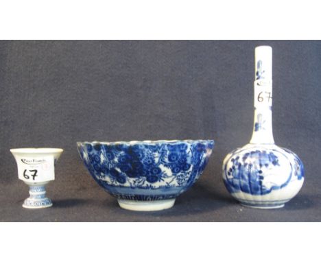 A mixed lot of Japanese blue and white porcelain items to include; a printed blue and white flower head decorated fluted bowl