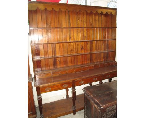 19th Century style oak two stage rack back pot board dresser having moulded cornice and shaped apron above three fitted shelv