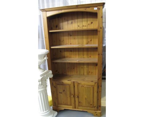 Modern pine open bookcase on bracket feet. (B.P. 24% incl. VAT)