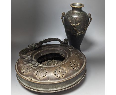 A Chinese bronze vase, 12cm., and an Islamic pierced brass lamp