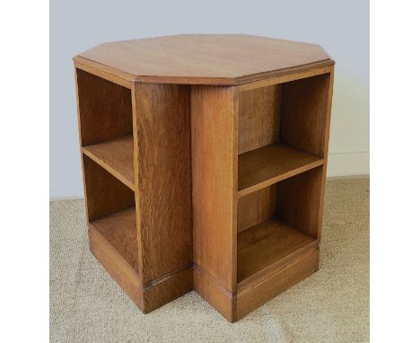 A 1930's Heals style octagonal golden oak book table, width 60cm, height 58cm