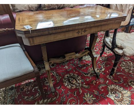 A Regency rectangular inlaid mahogany folding card table, width 91cm, depth 44cm, height 75cm