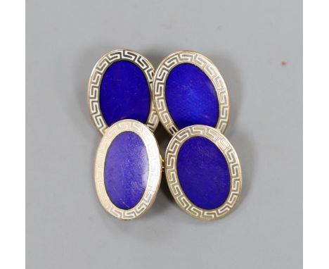 A modern pair of 9ct gold and two colour enamel set oval cufflinks, with Greek key border, 18mm, gross weight 10.5 grams.