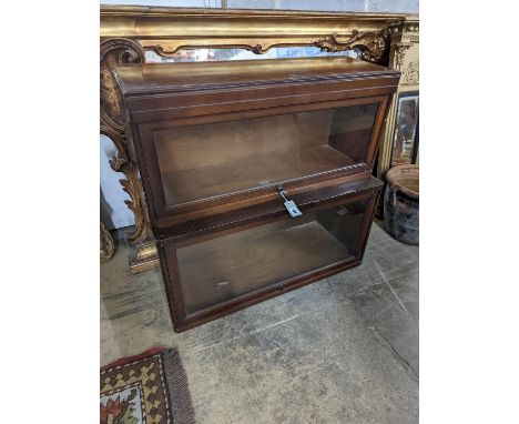 A Globe Wernicke mahogany two section bookcase, width 85cm, depth 36cm, height 80cm (wormed)