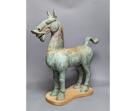 A large Chinese bronze figure of a horse, Han style 58cm