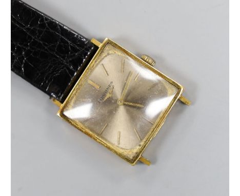 A gentleman's 1960's 18ct gold Longines manual wind dress wrist watch (part of strap missing), gross weight 22.5 grams.