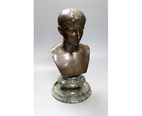 A bronze bust of Octavian, on associated marble socle, 42 cms high including stand.